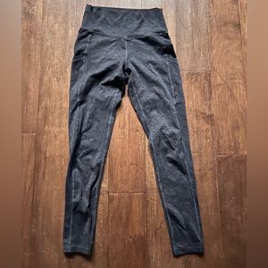 2 gray and green leggings